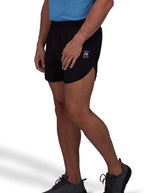 A person wearing black performance running shorts with a drawstring waist, featuring the Raging Bull logo on the front.