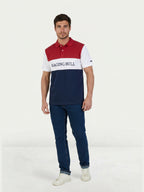 Man wearing a Raging Bull 3 colour panel pique polo in navy and Regular Jeans in Denim. 