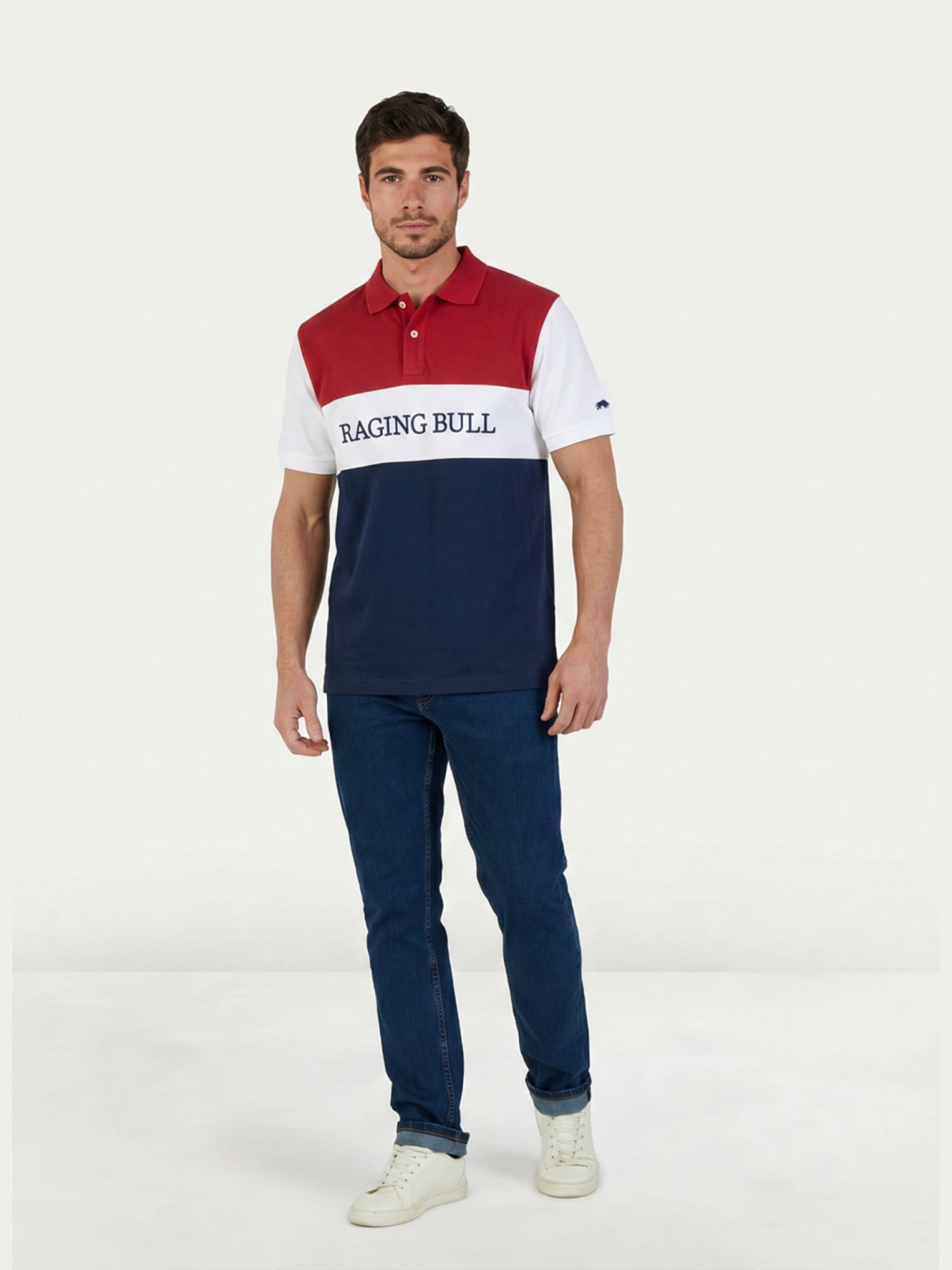 Man wearing a Raging Bull 3 colour panel pique polo in navy and Regular Jeans in Denim. 