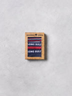 Raging Bull boxer briefs in a wooden box on a light gray background