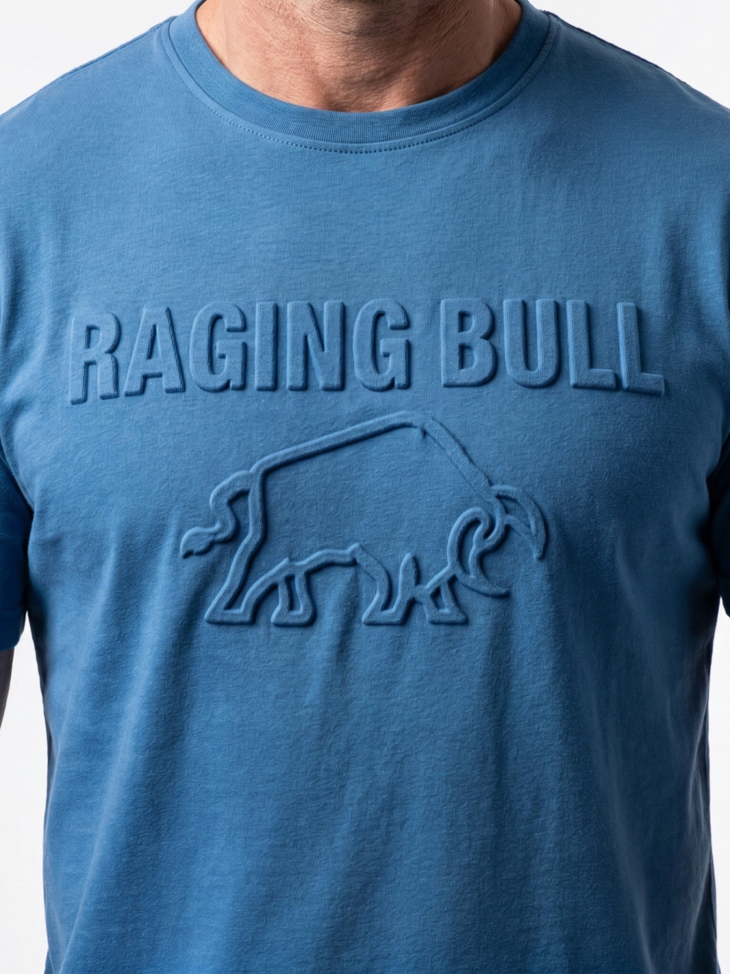 Blue t-shirt with 'Raging Bull' logo on a plain background