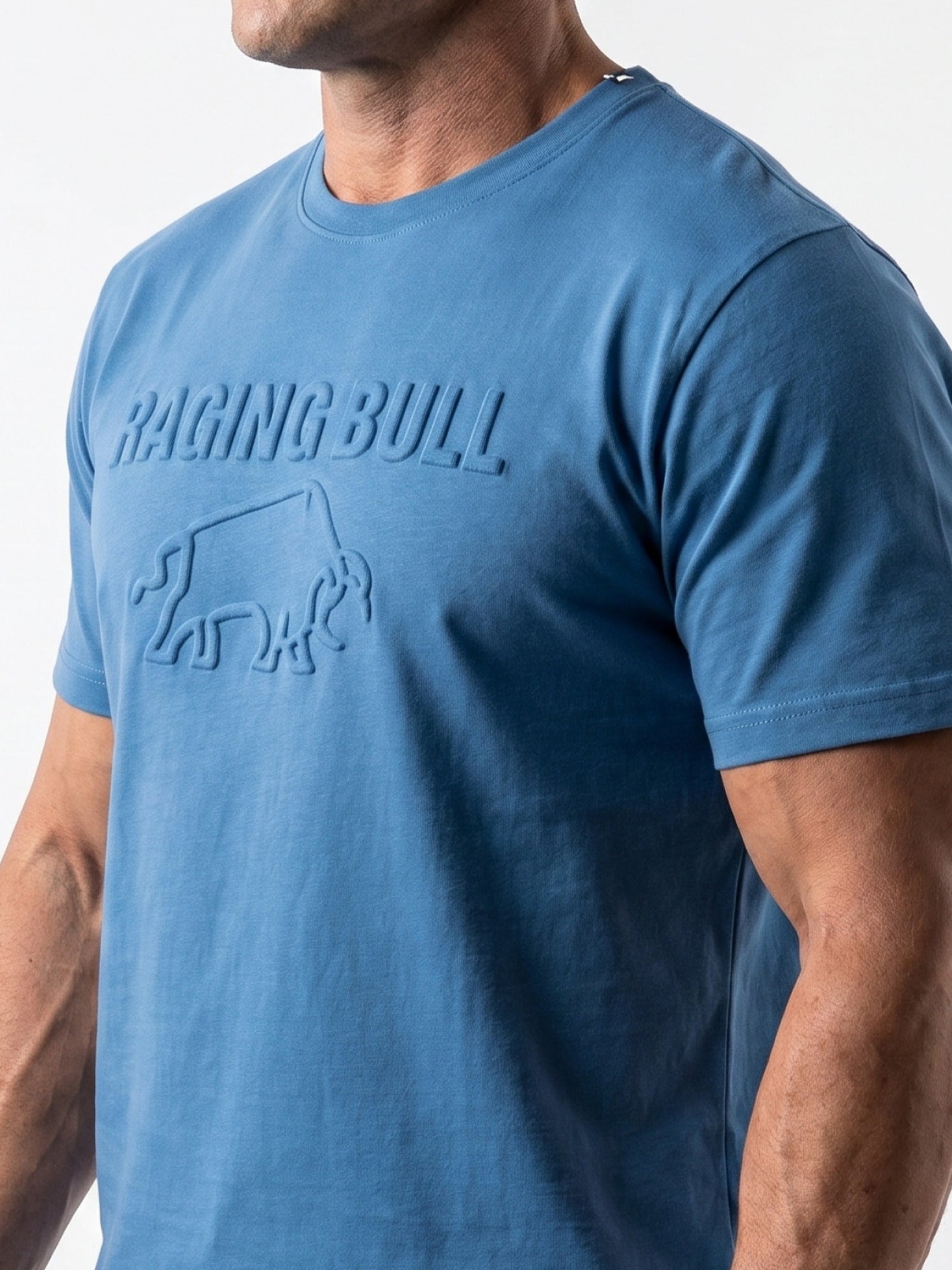 Blue t-shirt with 'Raging Bull' logo worn by a person