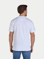 Man wearing a plain white t-shirt and blue jeans on a light gray background