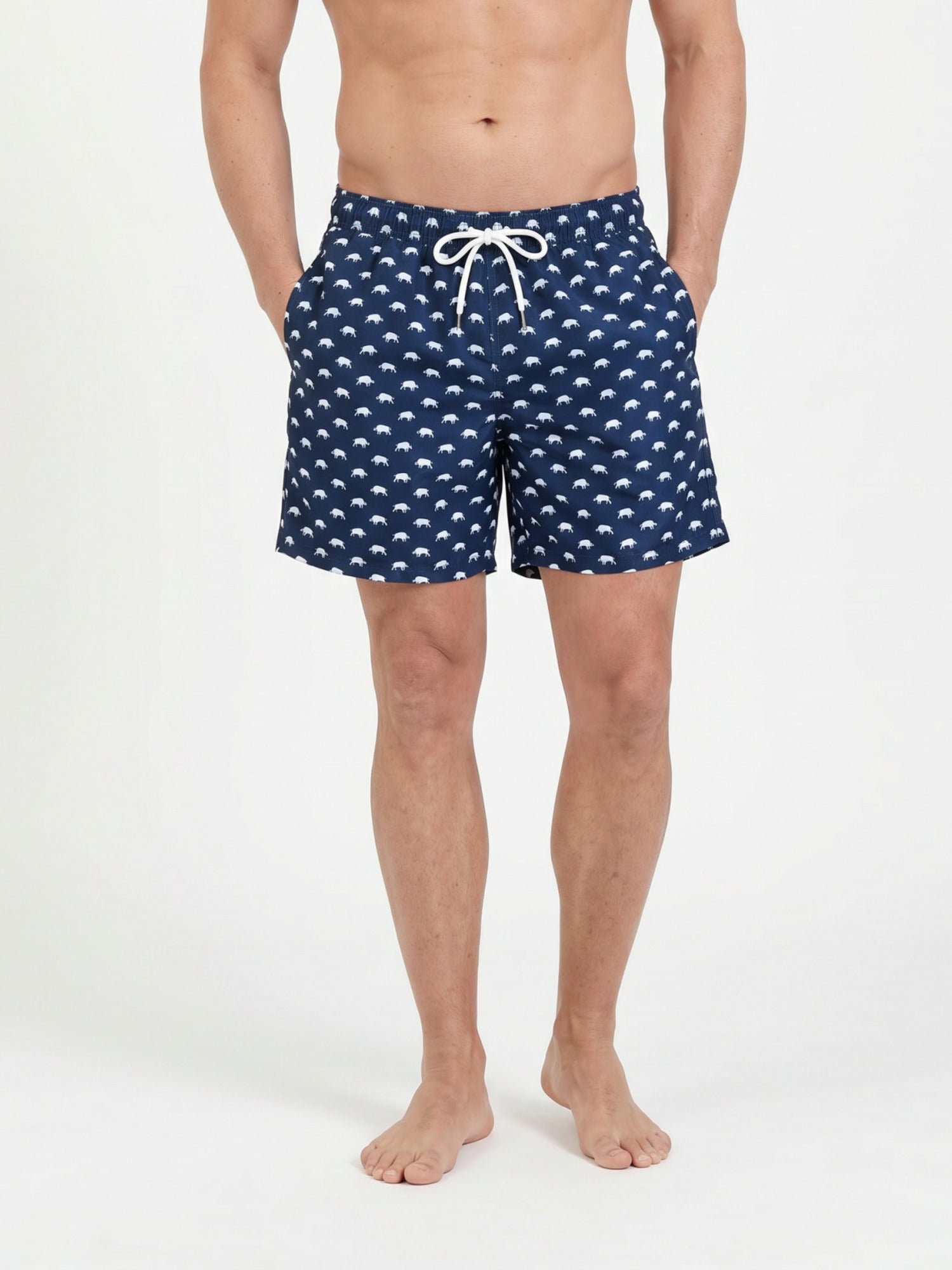 Man wearing Raging Bull Bull print swim shorts navy. 