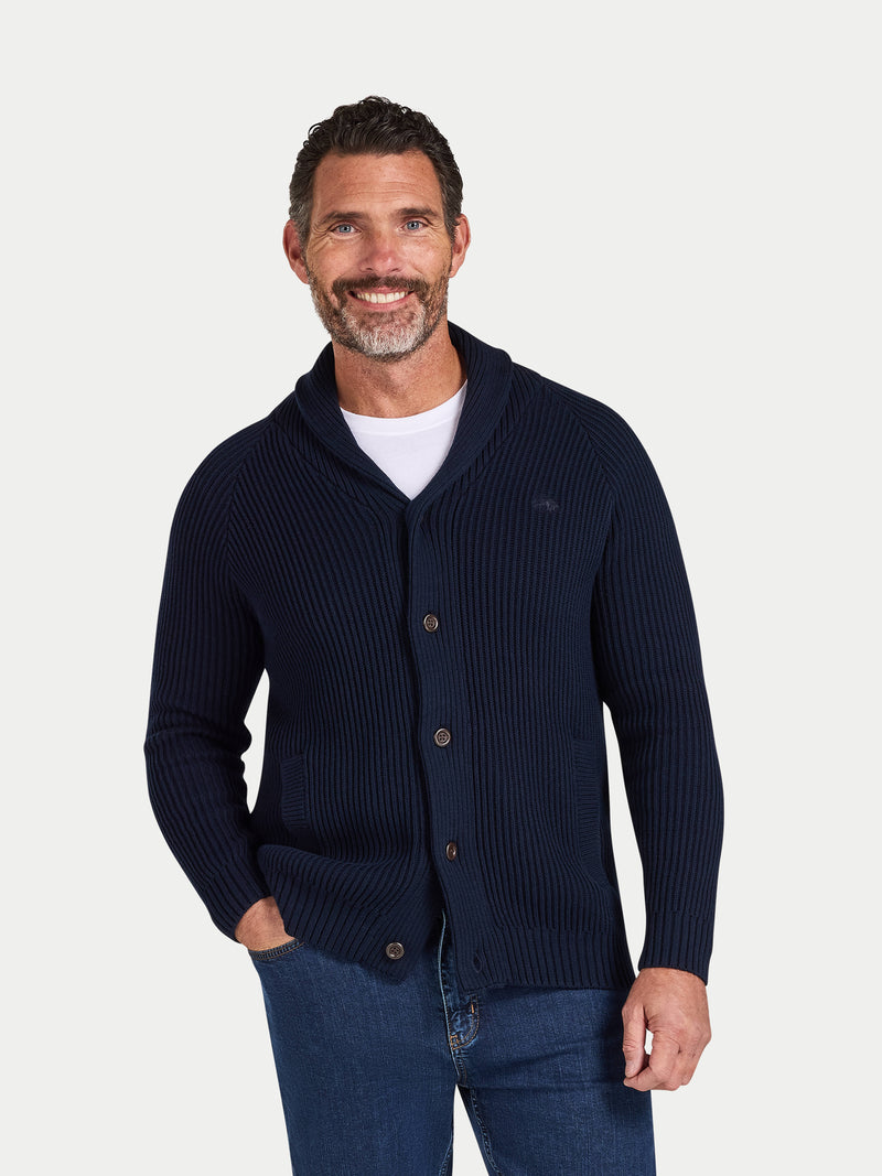 Man wearing a navy blue cardigan on a white background