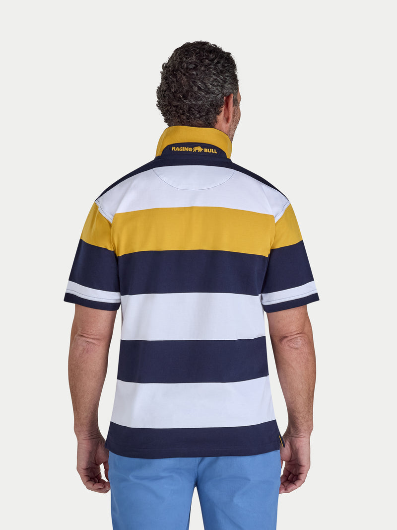 Man wearing a striped polo shirt with a visible brand logo on the chest.