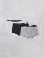 Three pairs of Raging Bull underwear on a light gray background