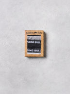 Raging Bull boxer briefs in a wooden box on a light gray background