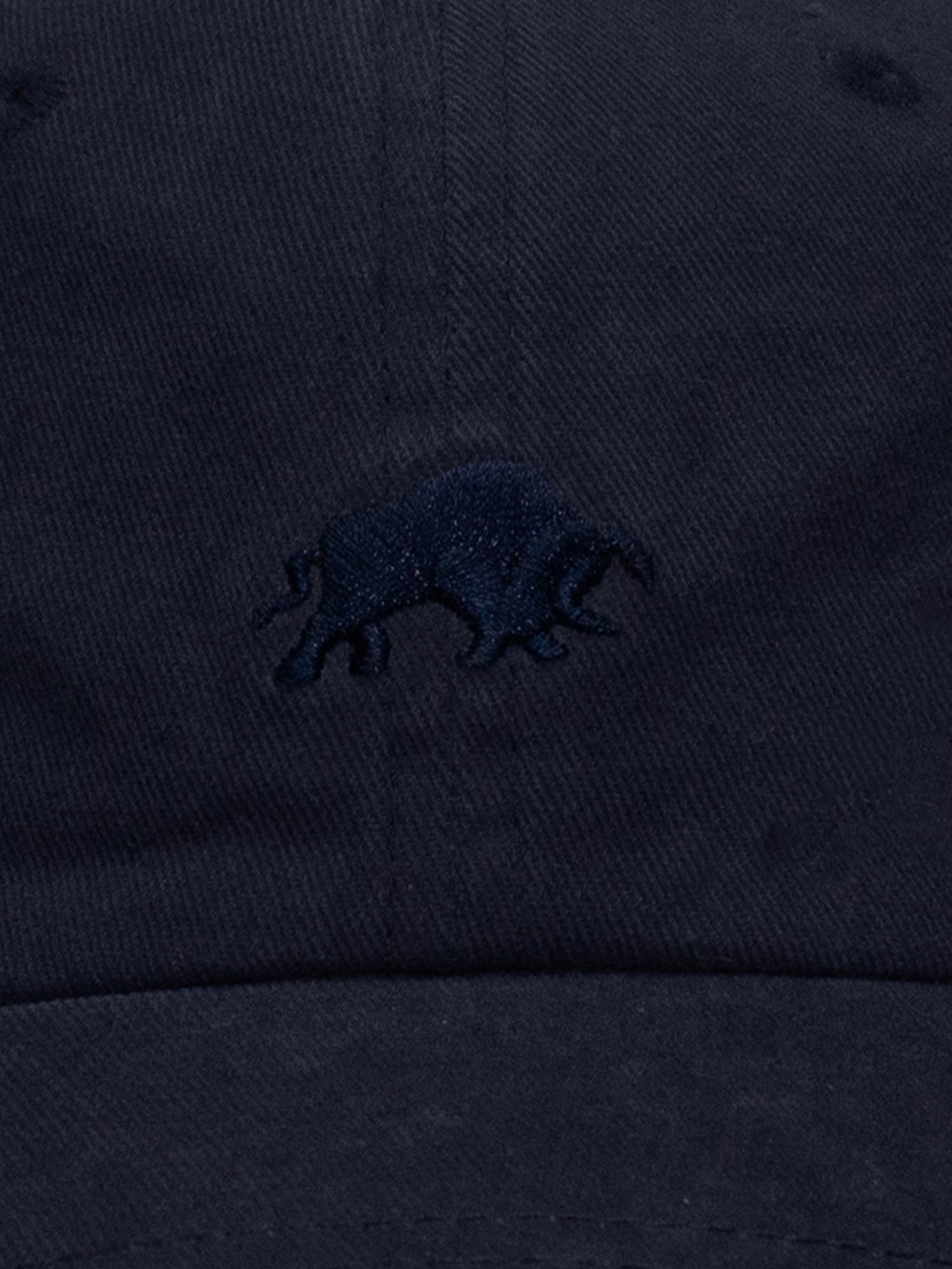 Close-up of navy blue cap with a small Raging Bull logo.