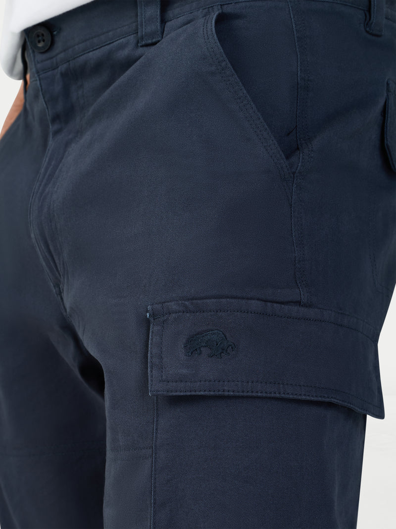 Navy blue cargo shorts with a Raging Bull logo on the pocket against a white background