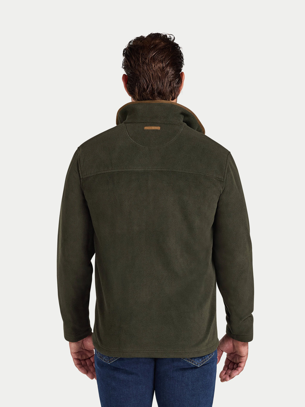 Man wearing a green jacket on a white background