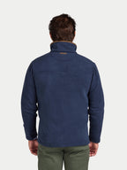 Man wearing a blue fleece jacket on a white background