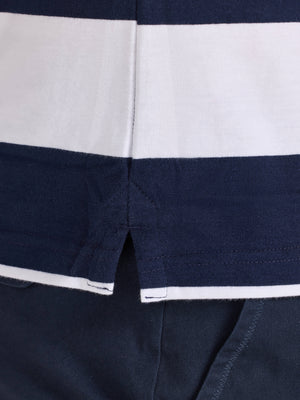 Close-up of a navy and white striped shirt collar