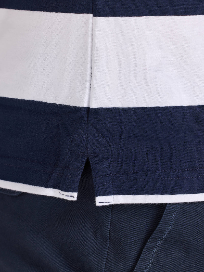 Close-up of a navy and white striped shirt collar