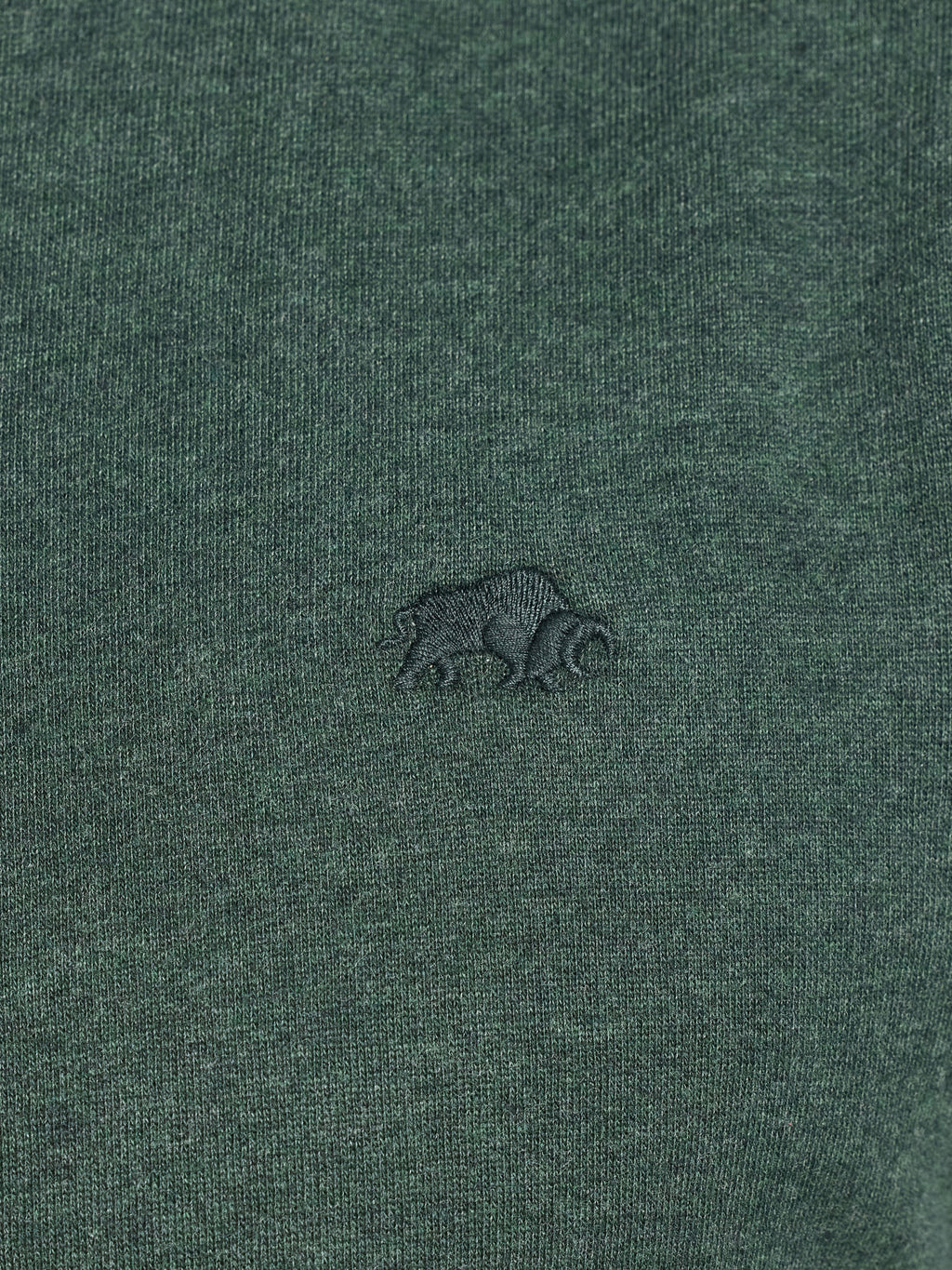 Green fabric with a small logo on a green background
