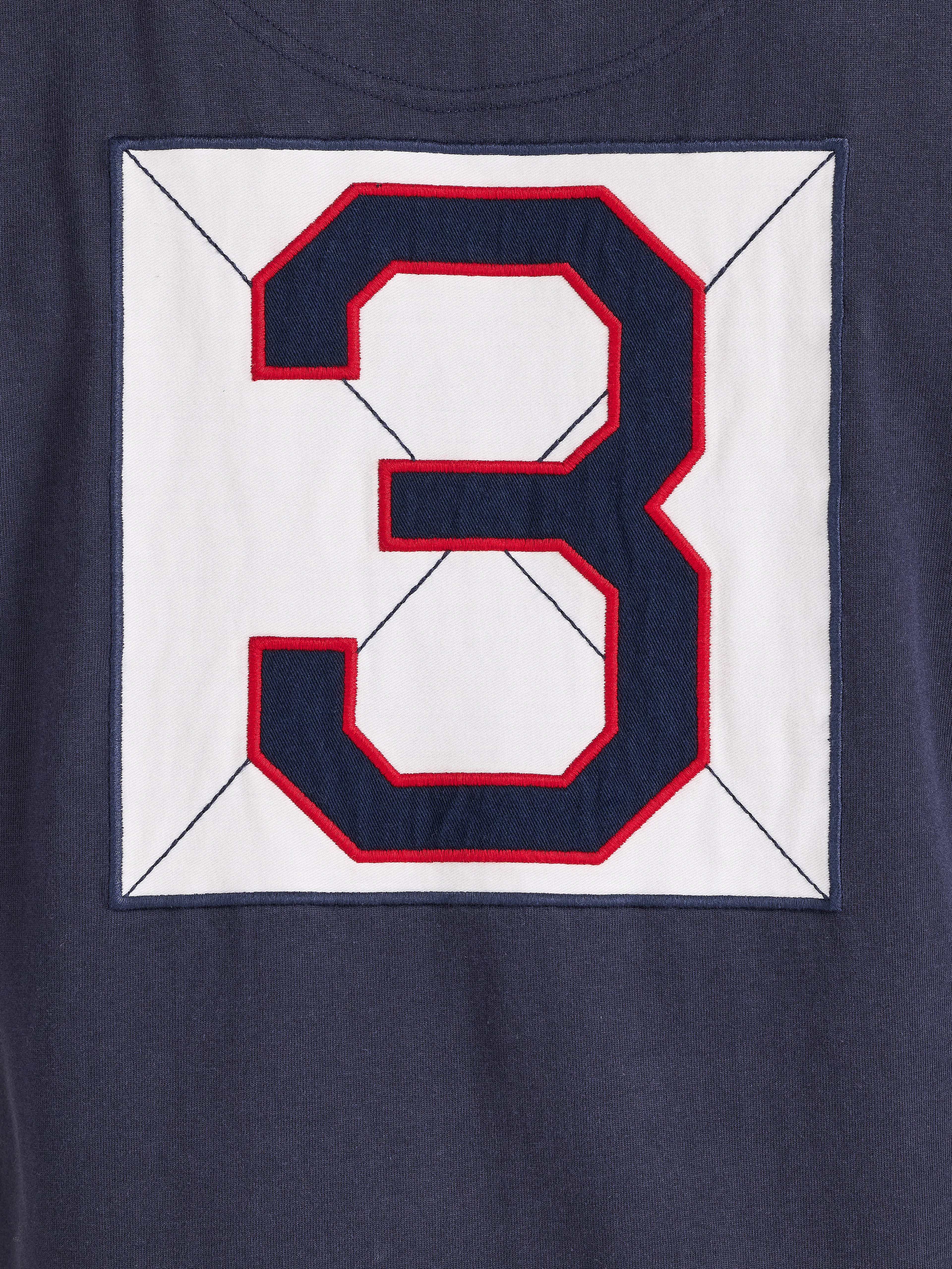 Navy blue shirt with a large red and white number '3' on a white background