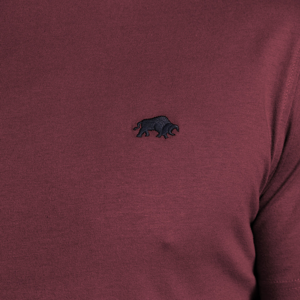 Maroon long-sleeve shirt with a black bear logo on the chest.