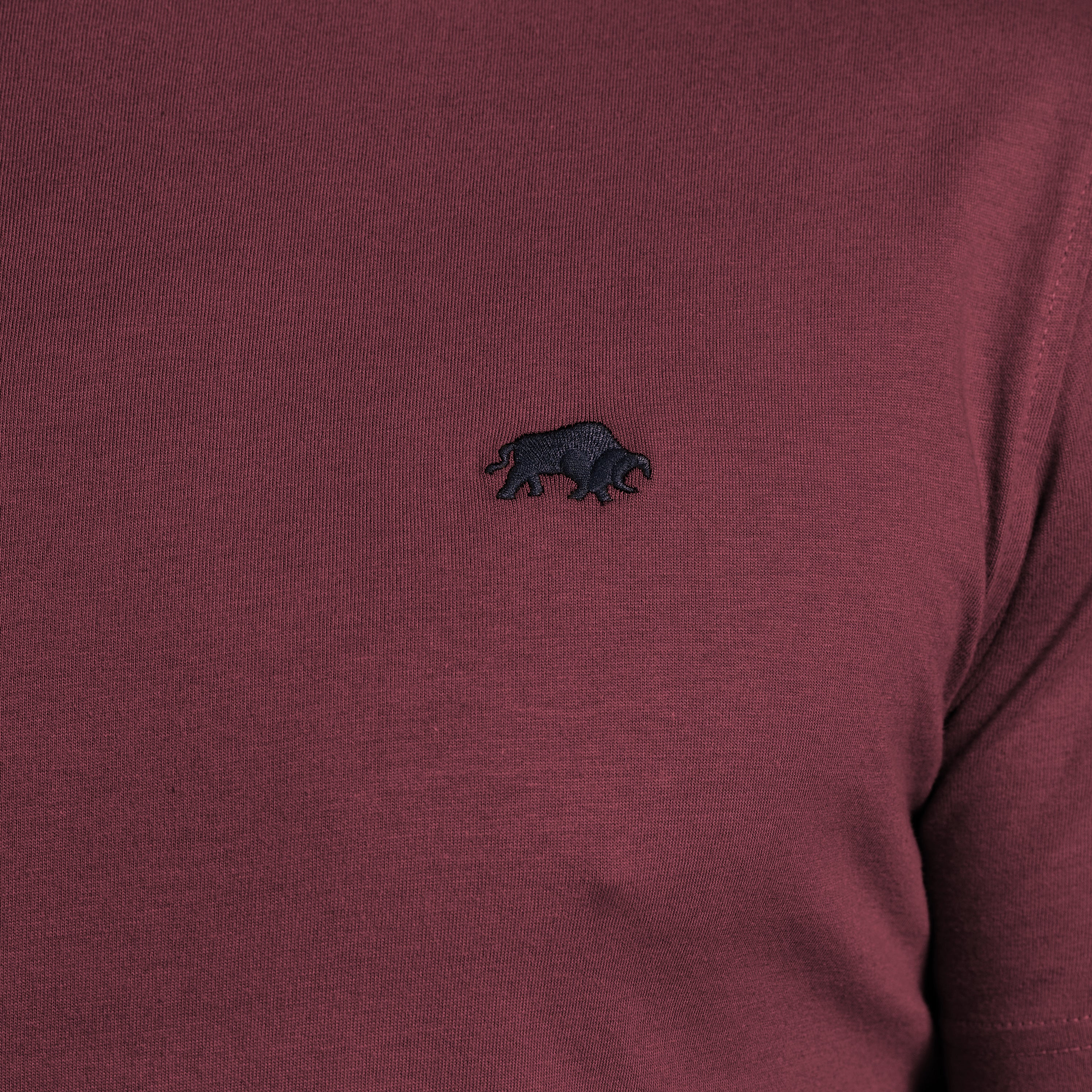 Maroon long-sleeve shirt with a black bear logo on the chest.