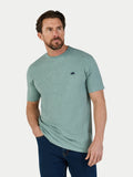 Man wearing a green t-shirt with a small Raging Bull logo on a white background