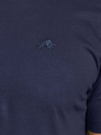 Navy blue sweater with a small embroidered logo on the chest.
