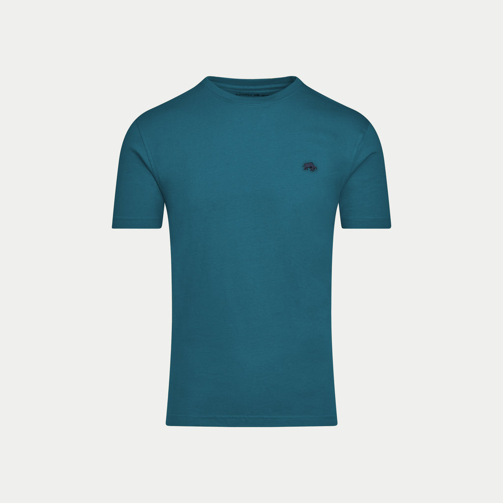 Teal t-shirt with a small logo on a light gray background