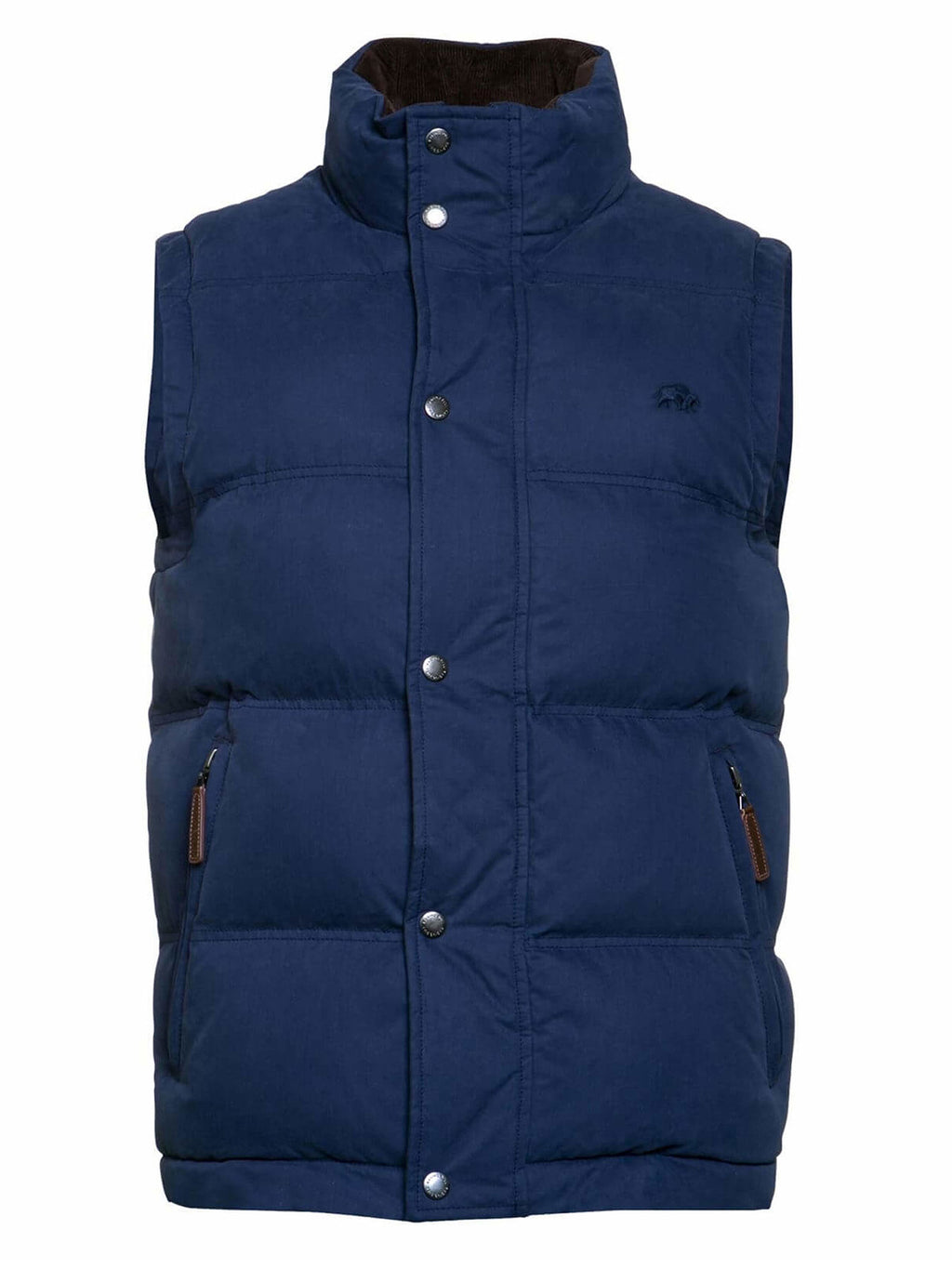 A male model wearing a navy padded gilet with zip pockets and a zip through fastening, standing in front of a sports stadium seating.