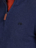 Navy blue sweater with a small logo on the chest