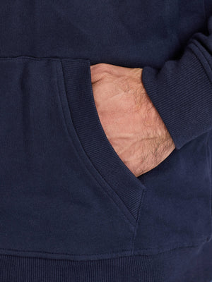Navy blue sweatshirt with a hand inserted into the pocket