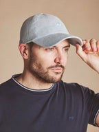 Man wearing a Raging Bull Corduroy cap in Blue, front. 