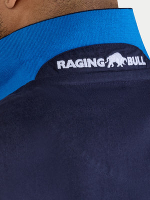 Navy blue garment with 'Raging Bull' logo on a white background