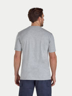 Man wearing a gray t-shirt on a white background