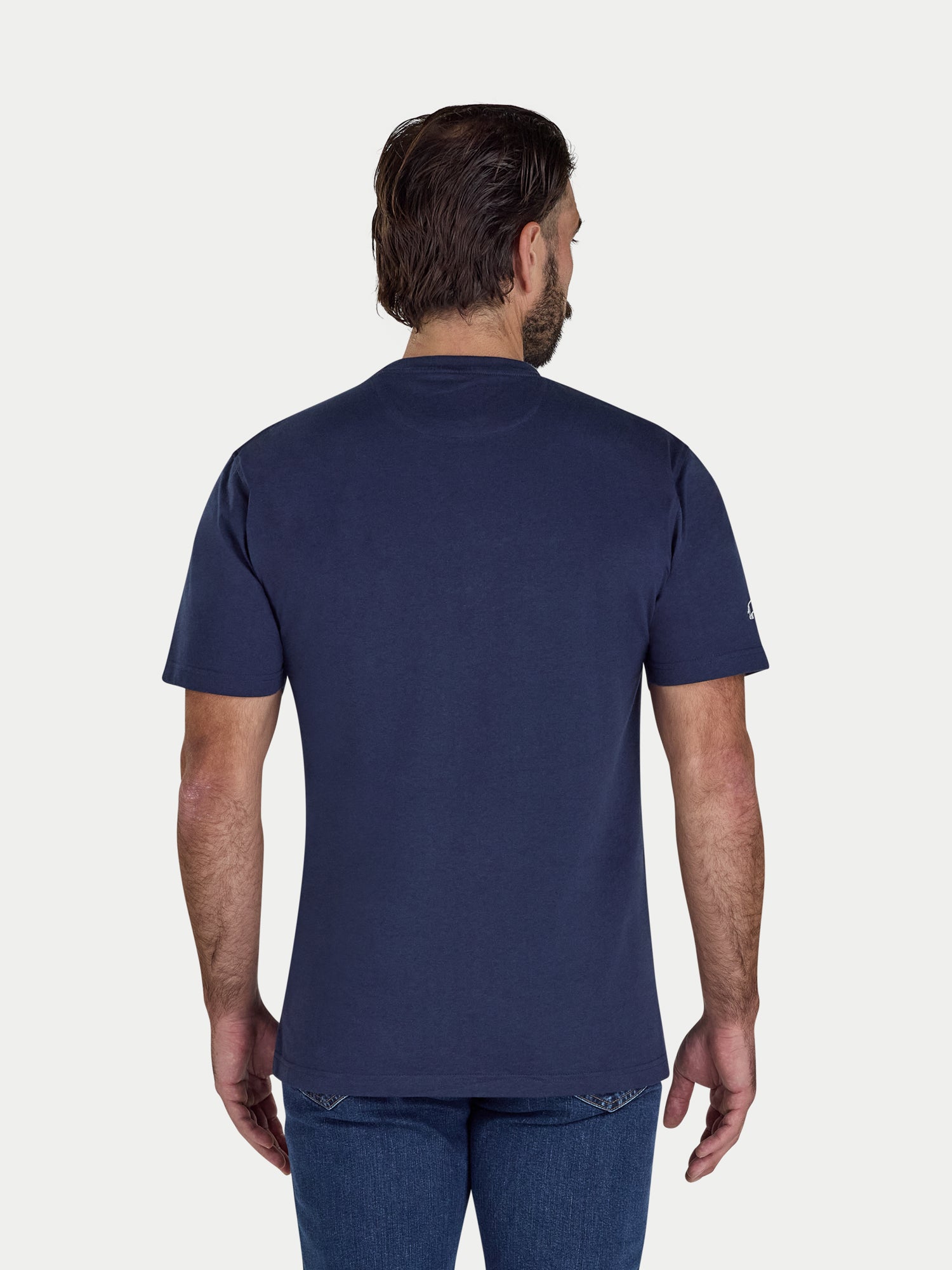 Man wearing a navy blue t-shirt on a white background