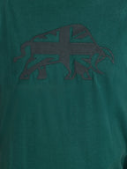 Green t-shirt with a black logo on a green background