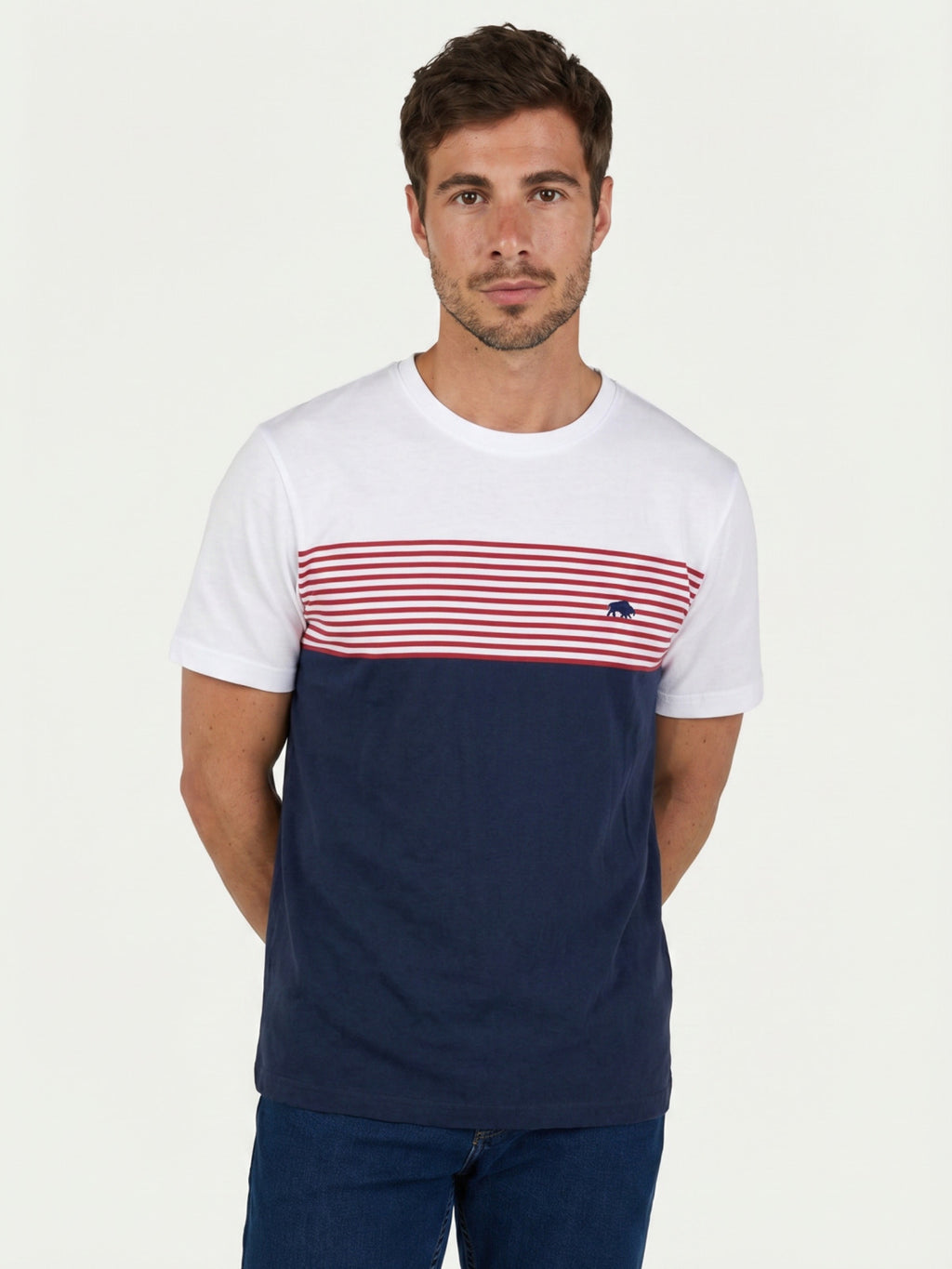 Man wearing a Raging Bull Engineered stripe t-shirt in white and navy, front. 