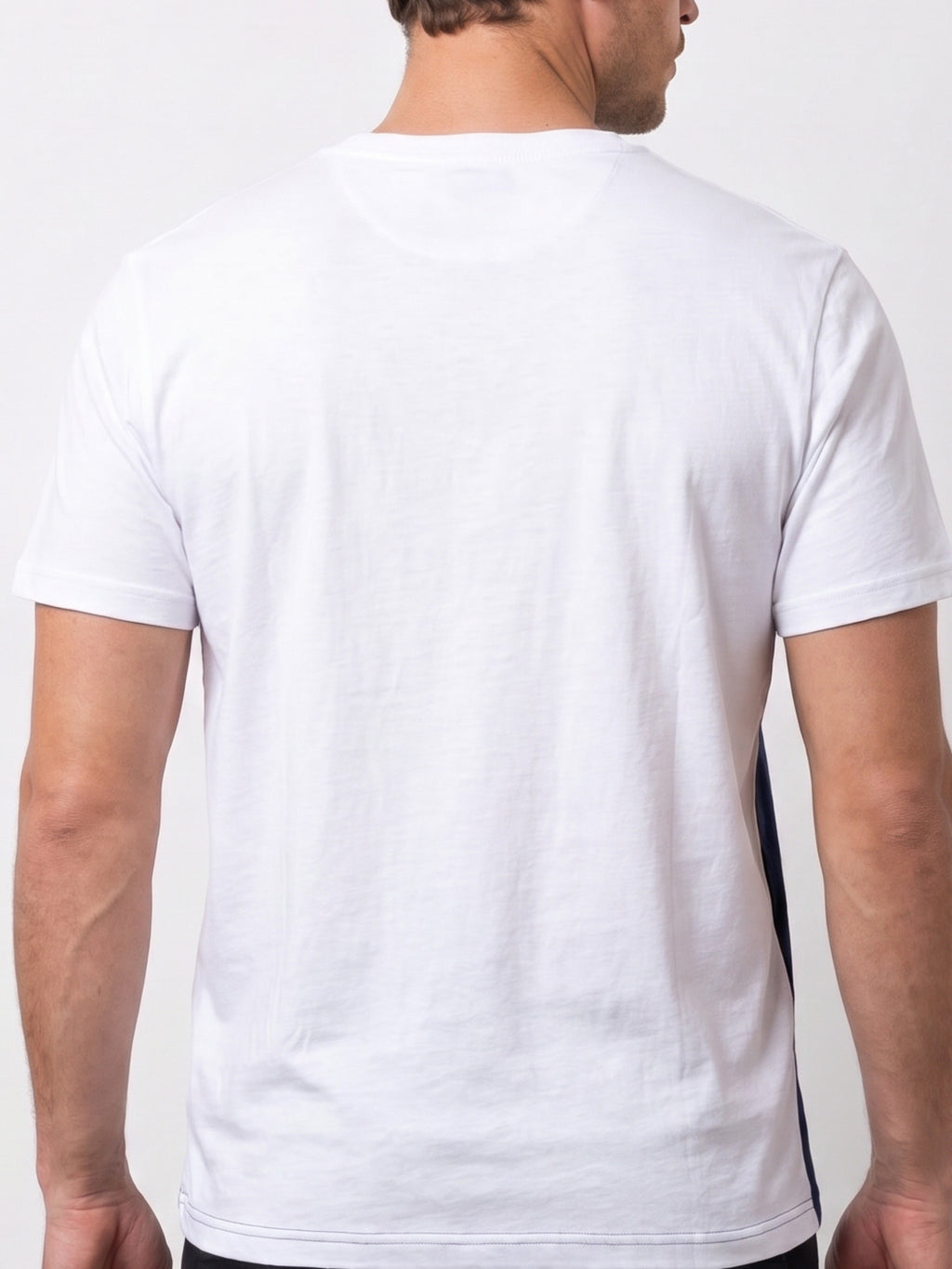 A man wearing Raging Bull Engineered stripe t-shirt, back. 