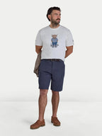 Man wearing Raging Bull Farmer Bully Boy t-shirt in ecru marl and Cargo shorts in navy. 