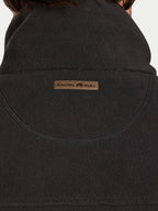 Close-up of a slate coloured fleece gilet with a brand logo on the chest.