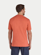 Man wearing an orange t-shirt on a white background