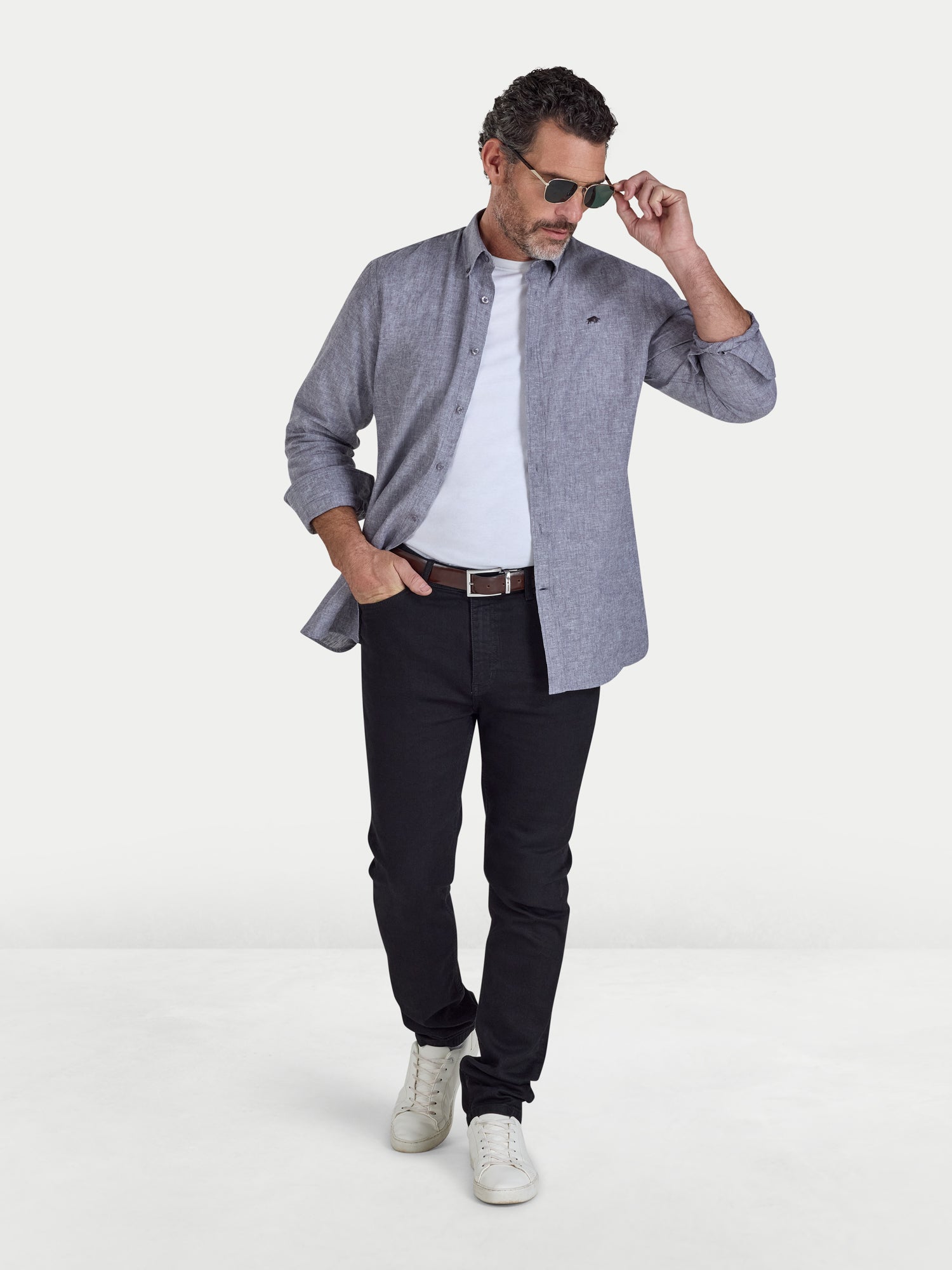 Man wearing Raging Bull Classic Linen Long Sleeve Shirt in Charcoal, Classic Organic T-Shirt in white and Regular Fit Jeans in black, available in sizes S-6XL