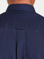 Man wearing Raging Bull Classic Oxford Long Sleeve Shirt in Navy, back collar detail, available in sizes S-6XL.