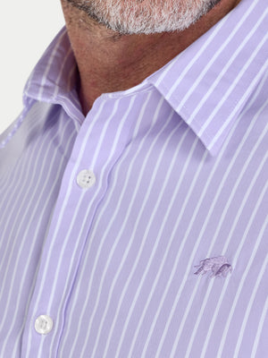 Close-up of a man wearing a purple striped shirt with a brand logo on a white background