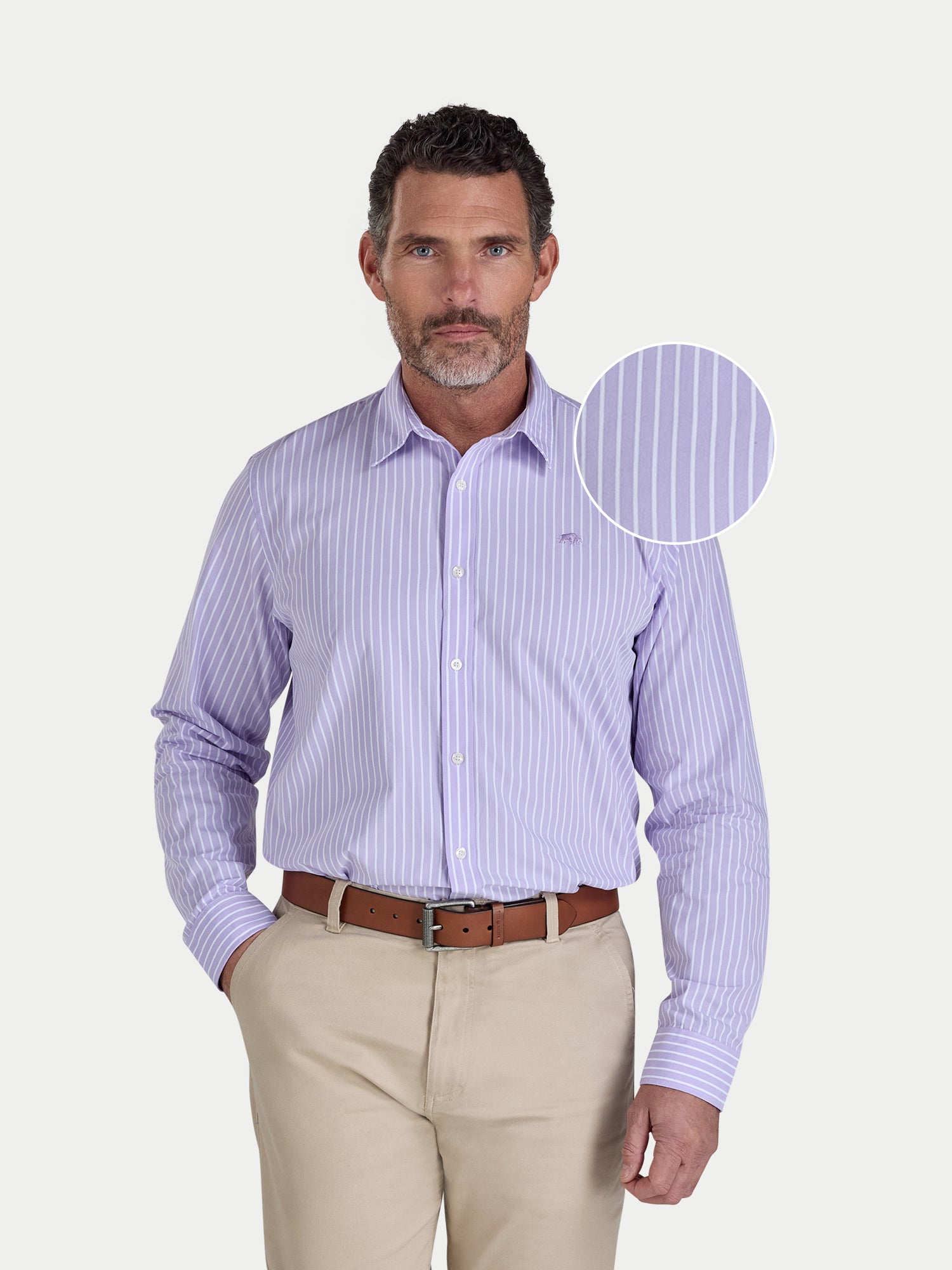 Man wearing a lilac striped shirt with a close-up of the fabric pattern on a white background.