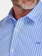 Close-up of a blue and white striped shirt with a collar.