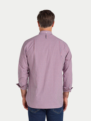 Man wearing a red and white checkered shirt on a white background