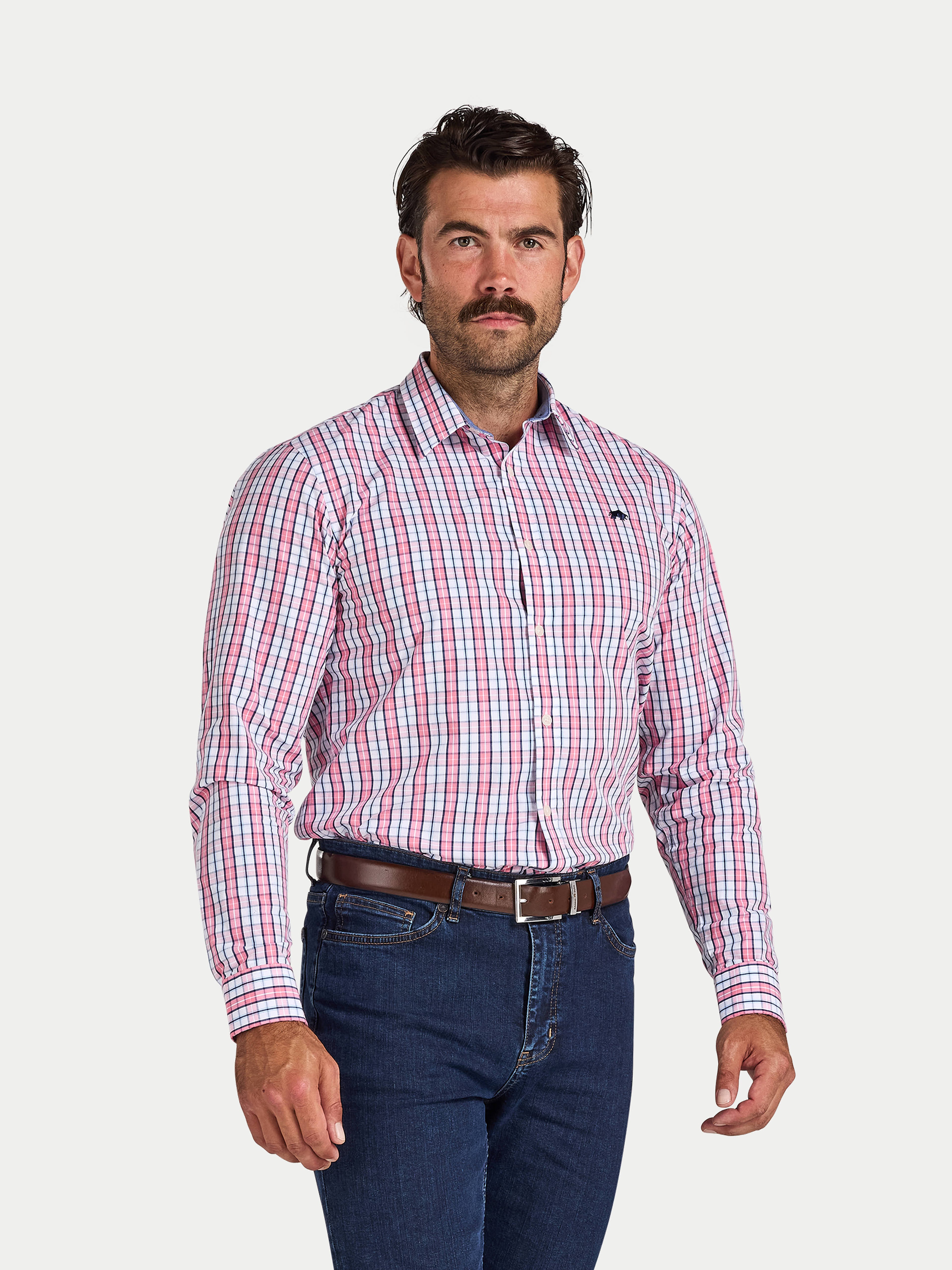 Man wearing Raging Bull Large Check Cotton Poplin Long Sleeve Shirt in Pink and regular Fit Jeans in Denim, available in sizes S-6XL.
