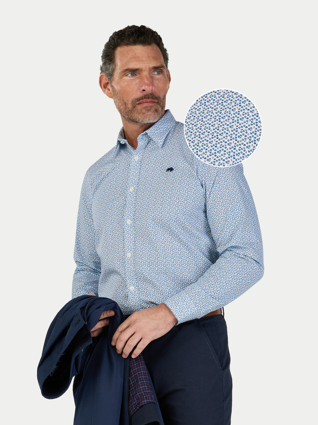 Man wearing Raging Bull long sleeve Pentagon pattern cotton poplin shirt in white, front detail.  