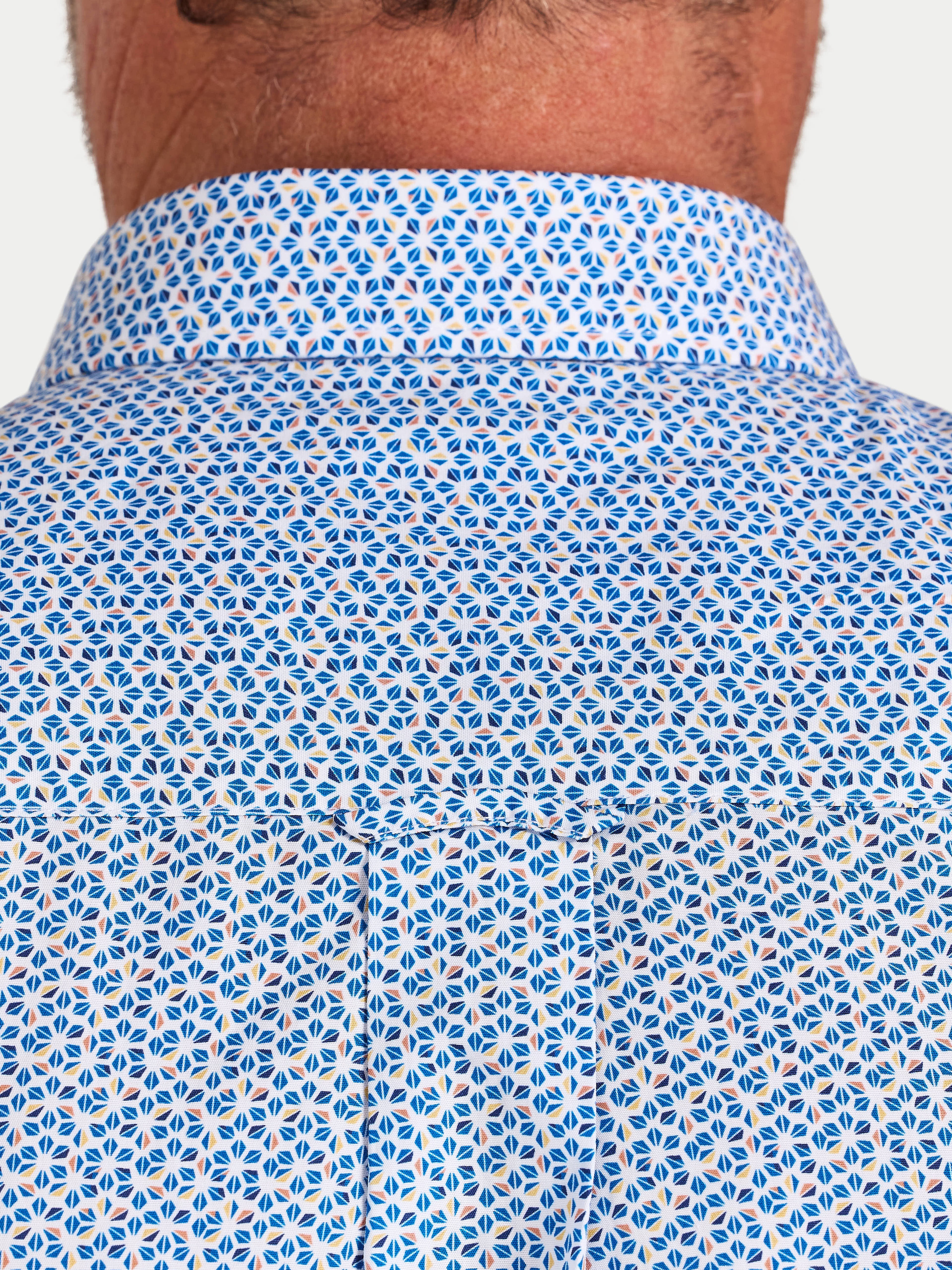 Close-up of a blue and white patterned shirt