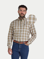 Man wearing Raging Bull long sleeve Suffolk check twill shirt in tan, front detail. 