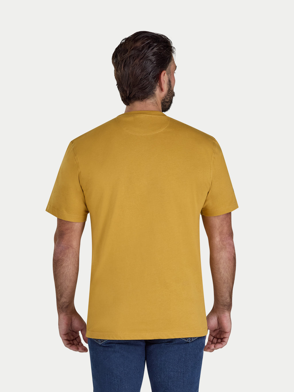 Man wearing a mustard yellow t-shirt on a white background