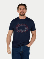 Man wearing a navy t-shirt with a graphic design on a white background